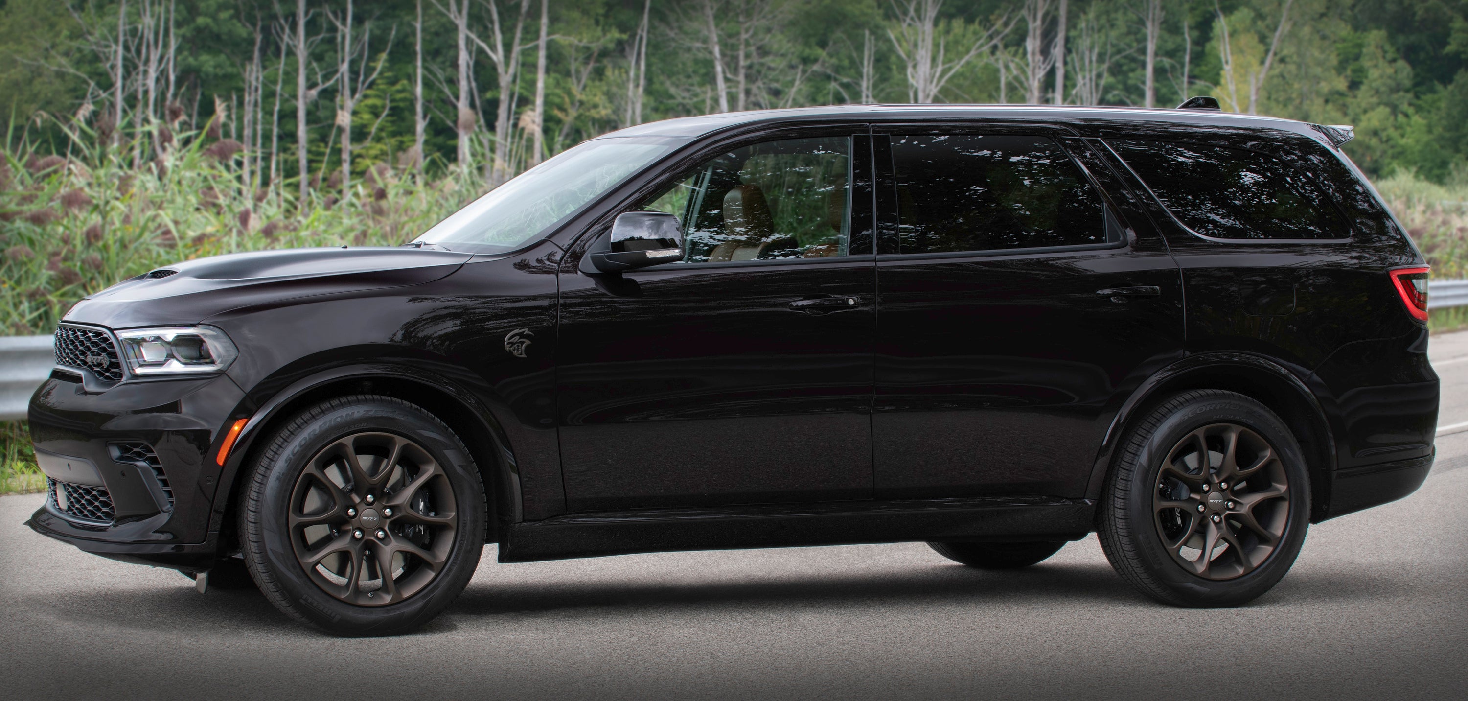 A black durango sitting parked.