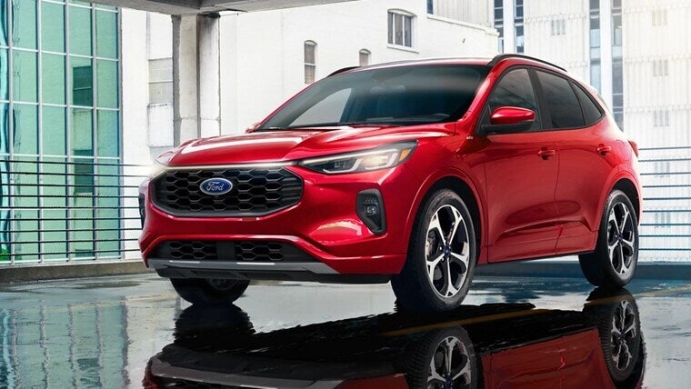 A red car sitting parked.