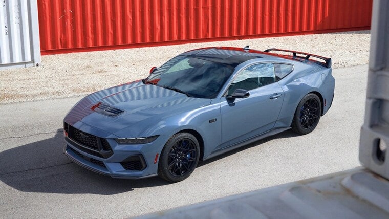 A ford mustang sitting parked.