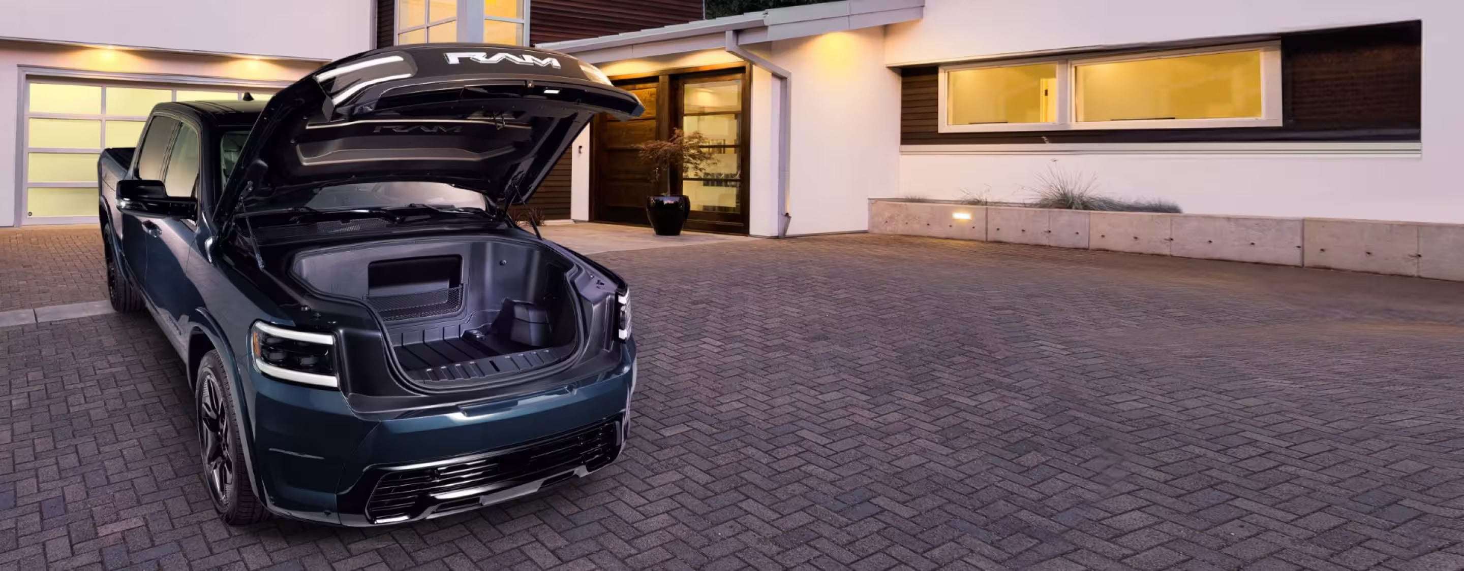 a 2025 ram 1500 rev with the front trunk shown open