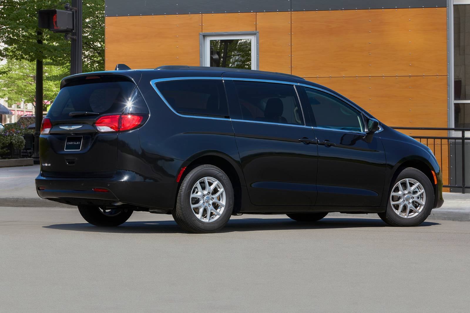 A black van sitting parked.