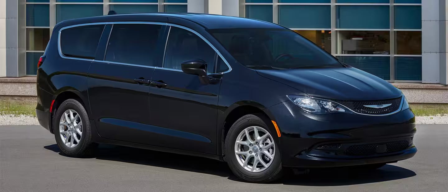 A black van sitting parked.