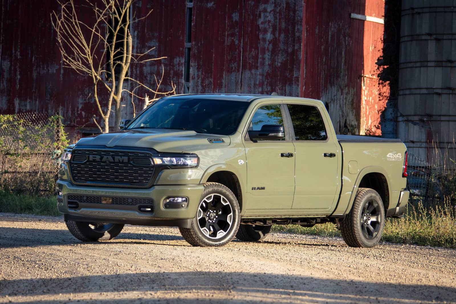 A green truck sitting parked.