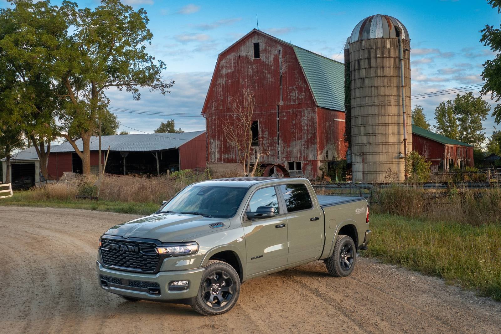 A green truck sitting parked.