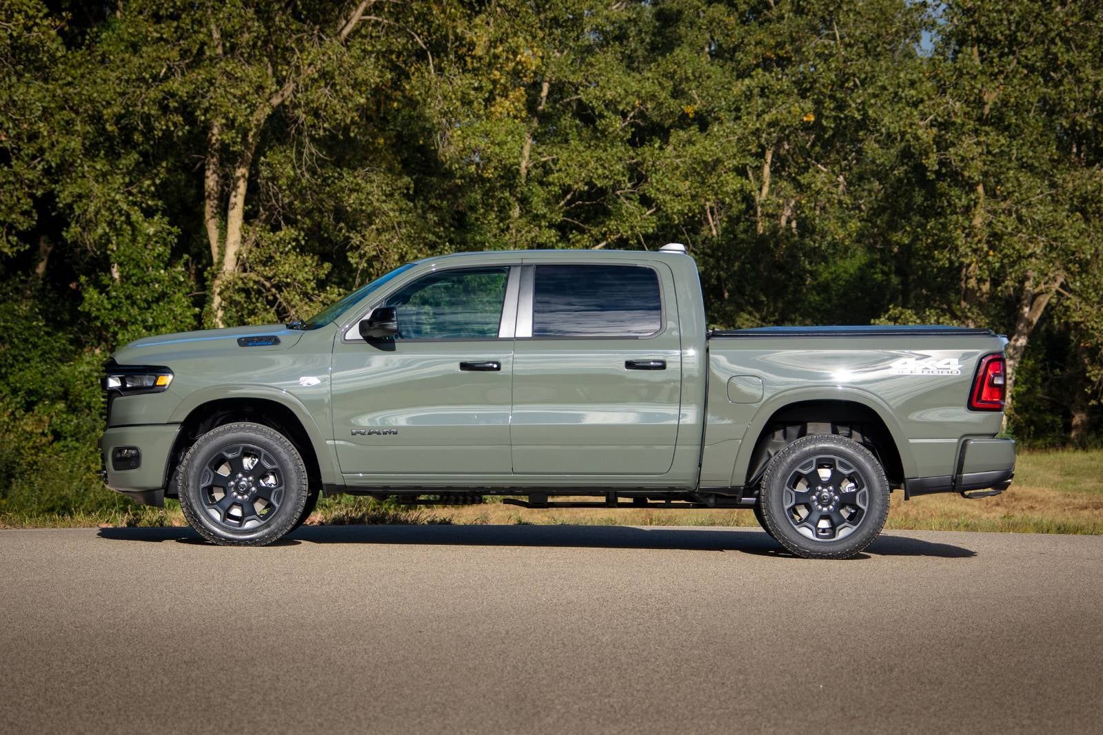 A green truck sitting parked.