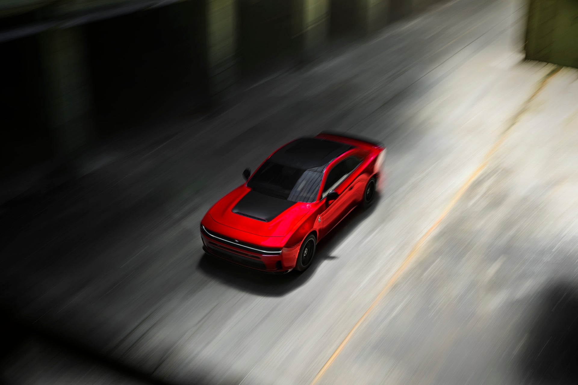 2026 Dodge Charger driving in a parking garage