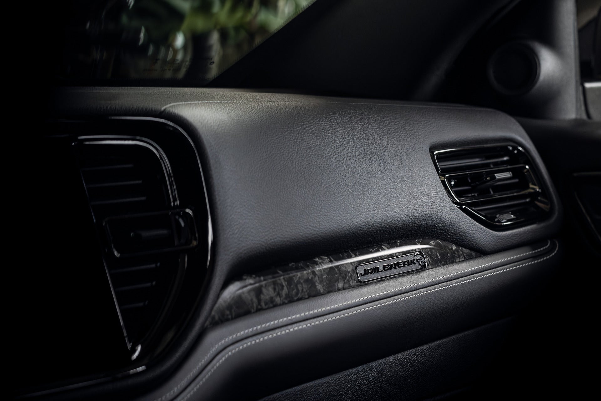 a interior view of the front dash on the passenger side of the vehicle
