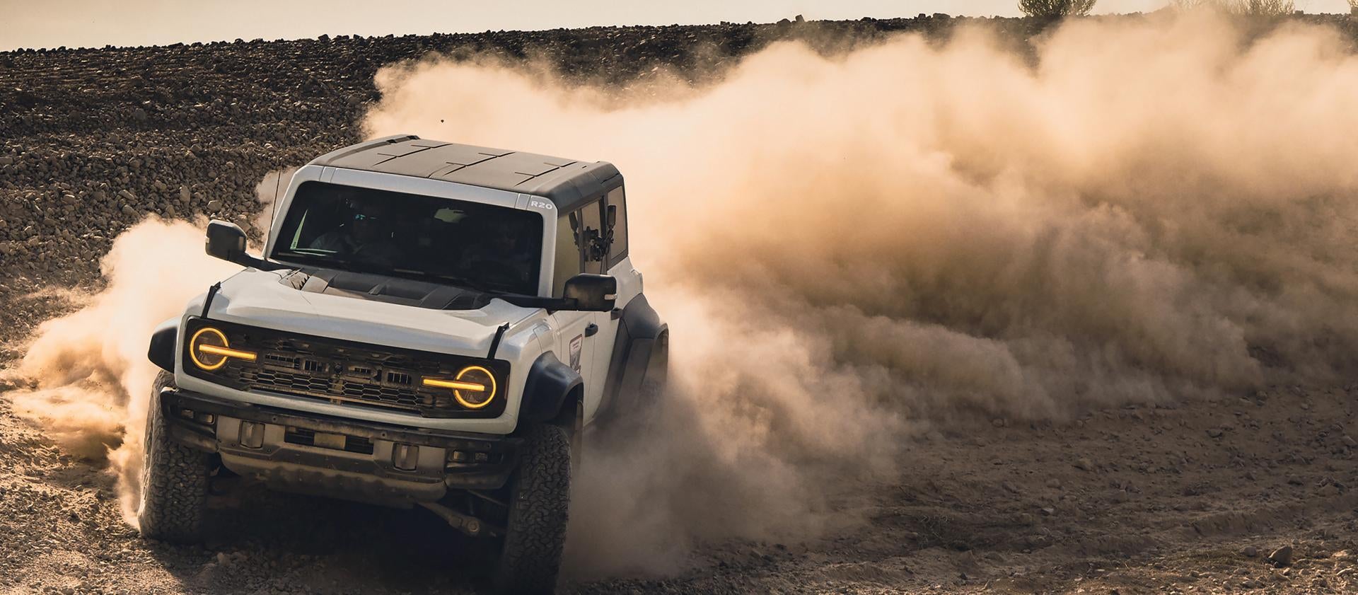 a new 2026 bronco driving in the desert