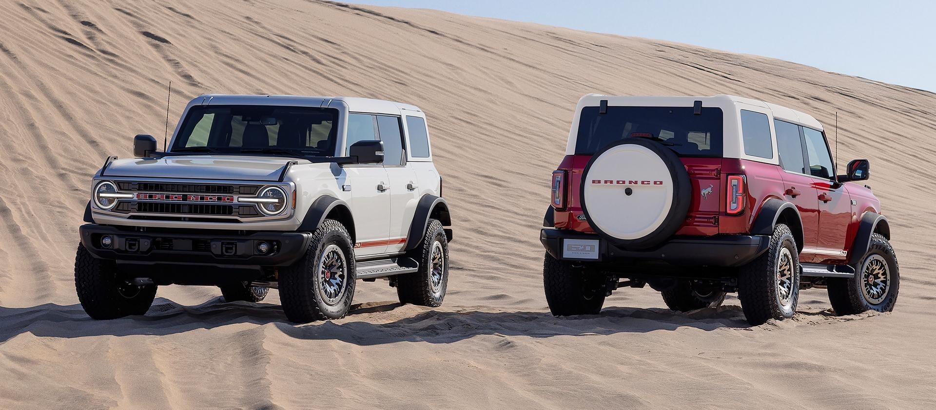 a new 2026 bronco driving in the desert