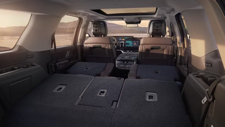 2026 Ford Expedition interior view of the all the seats laid down in the trunk