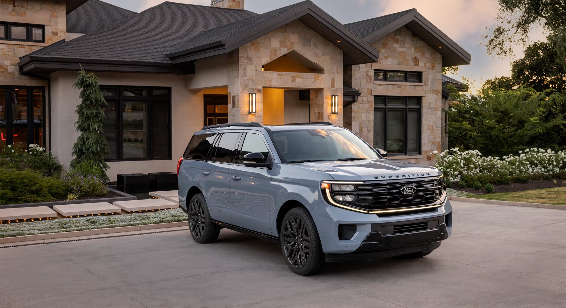 2026 Ford Expedition parked in front of a house