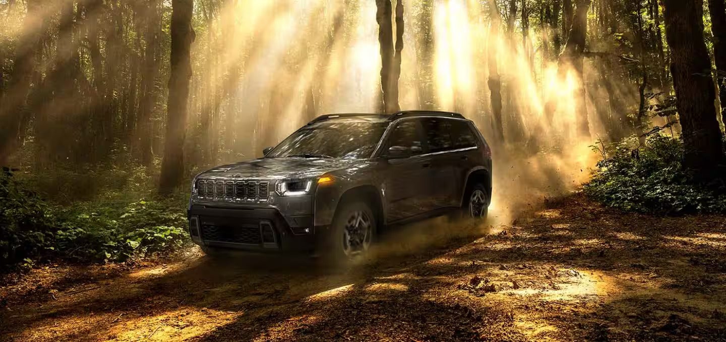 2026 Jeep Cherokee parked in the forest