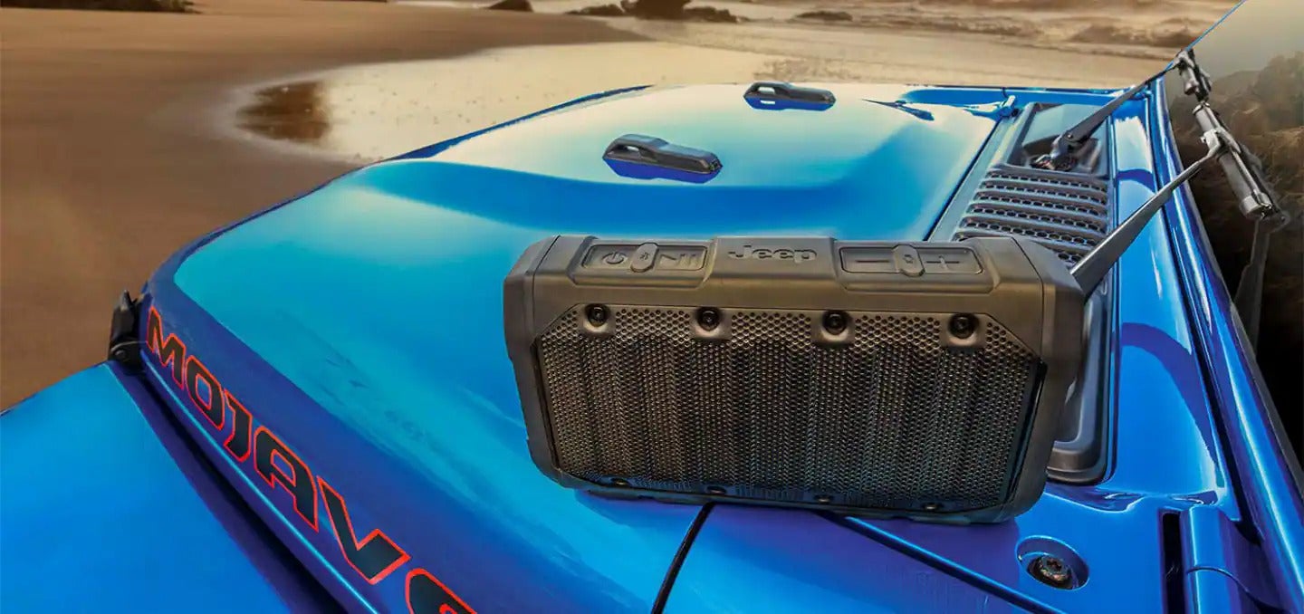 2026 Jeep Gladiator exterior view of a speaker sitting on the hood of the gladiator