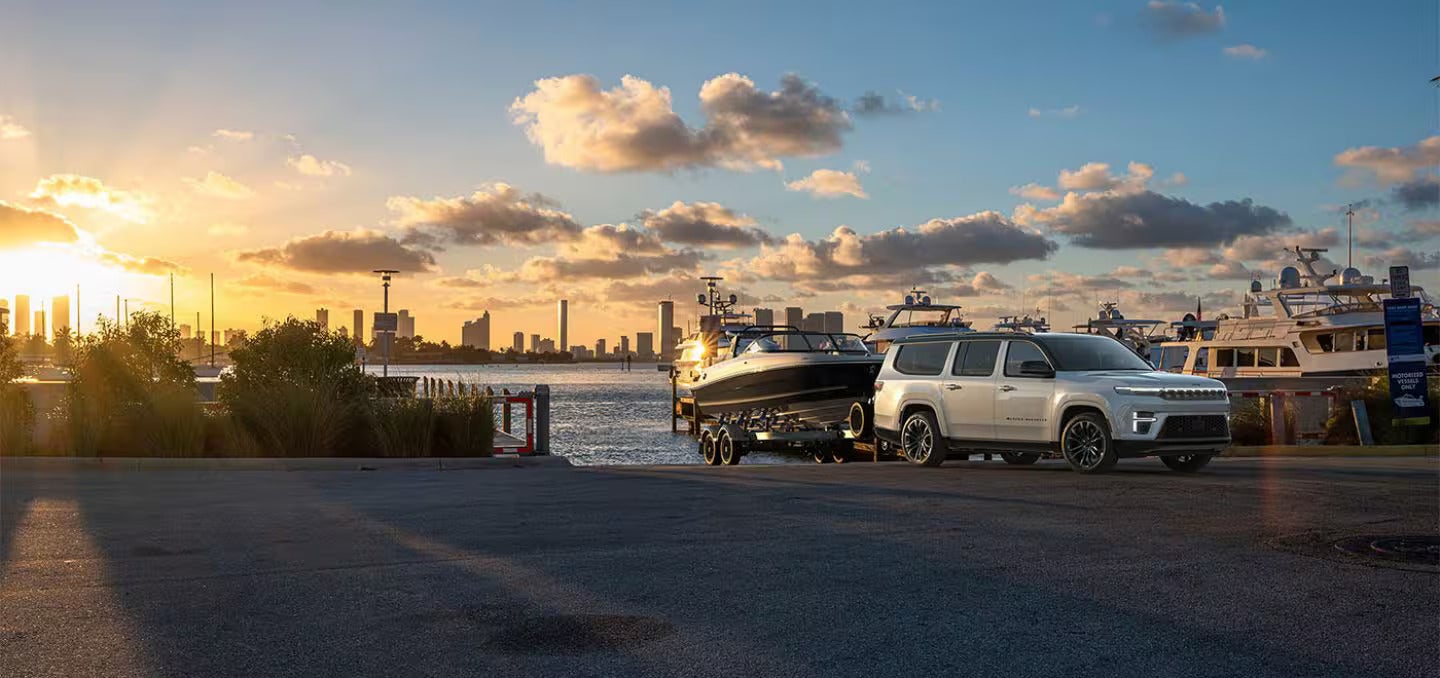 2026 Jeep Grand Wagoneer pulling a boat