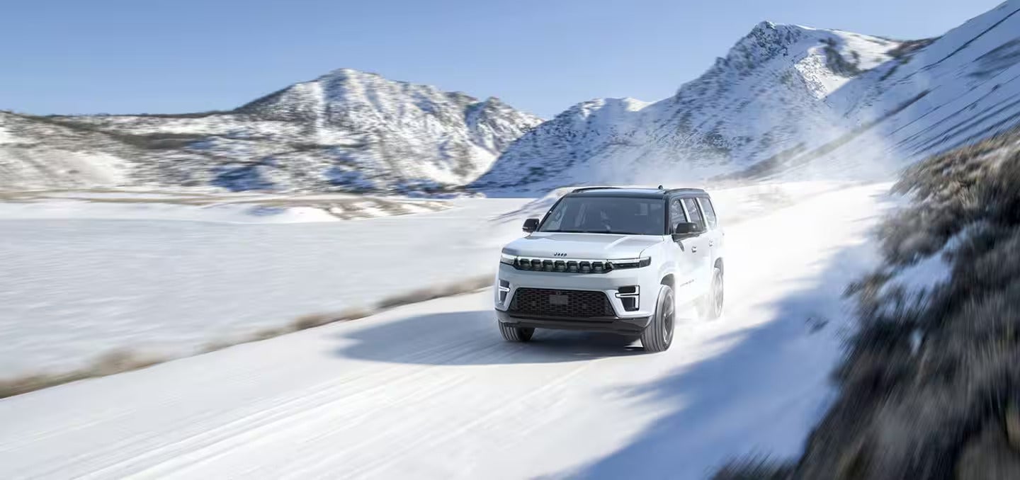 2026 Jeep Grand Wagoneer driving in the snow