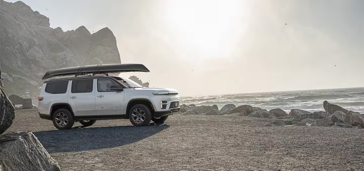 2026 Jeep Grand Wagoneer parked on the beach