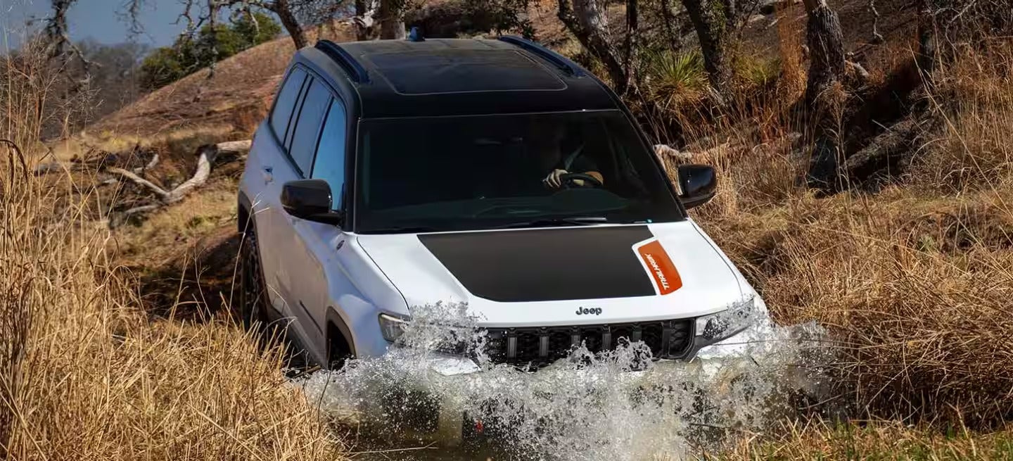 2026 Jeep Grand Cherokee driving through some water