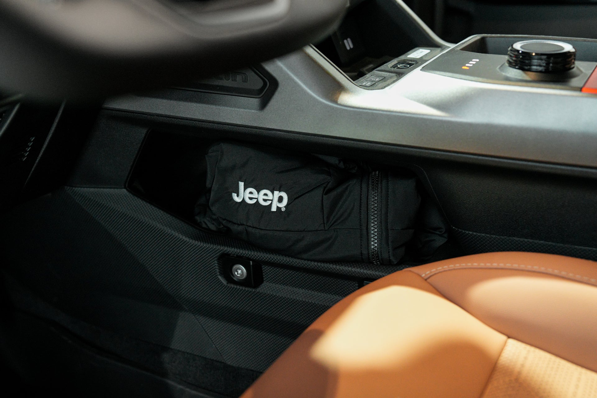 2026 Jeep Recon interior view of a first aid kit in the back of the trunk