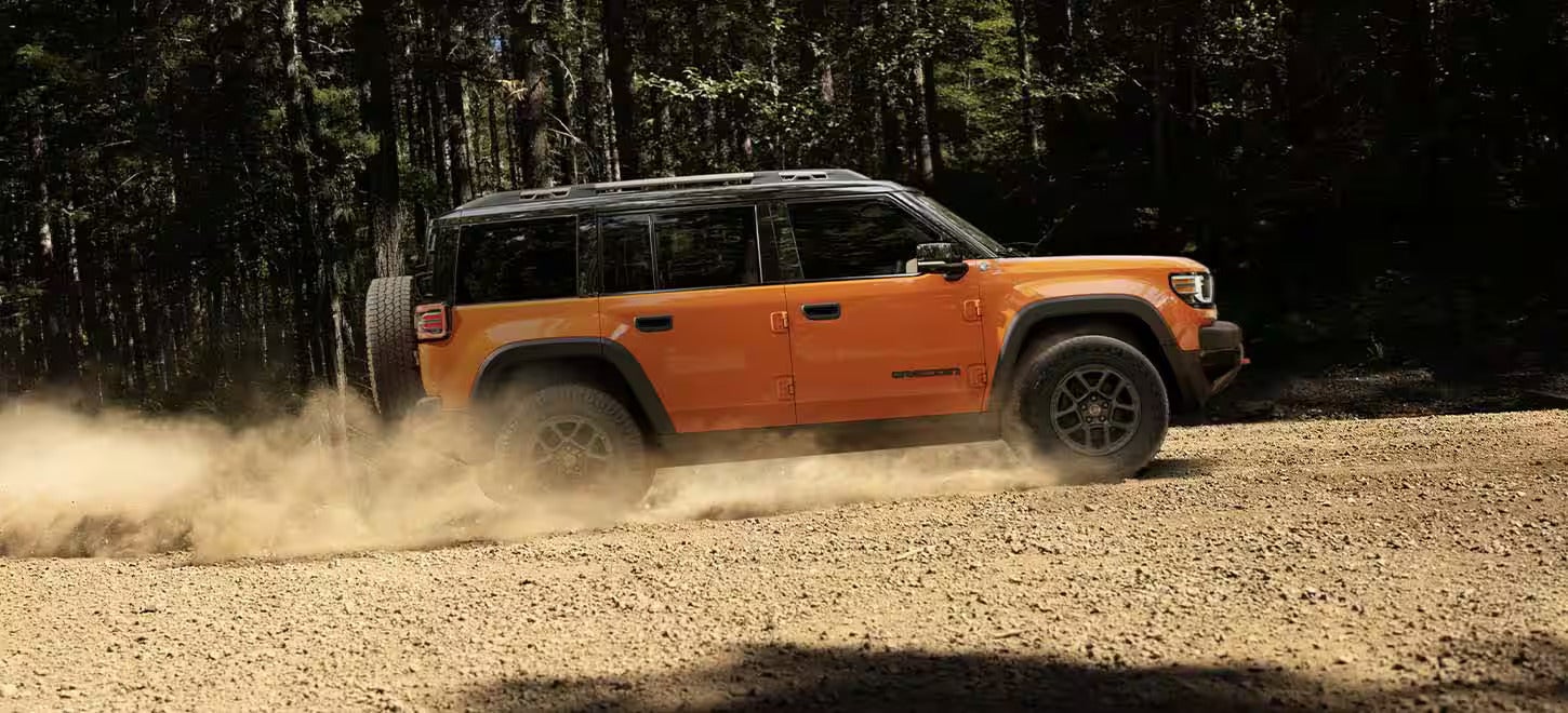 2026 Jeep Recon driving up a hill