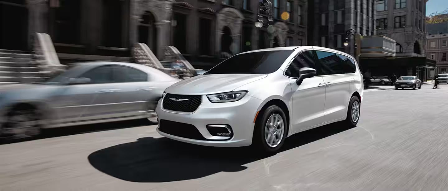 2026 Chrysler Pacifica driving in the city