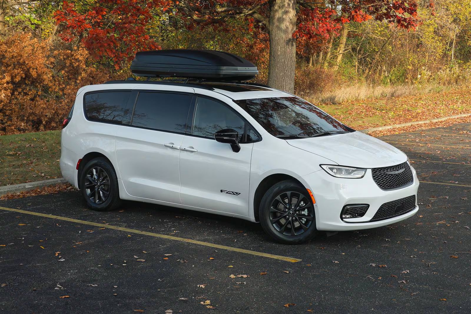 A white van sitting parked.
