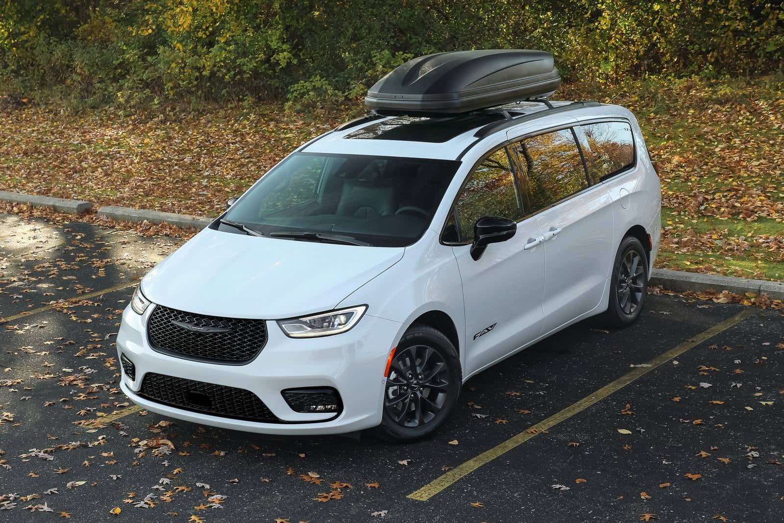 A white van sitting parked.