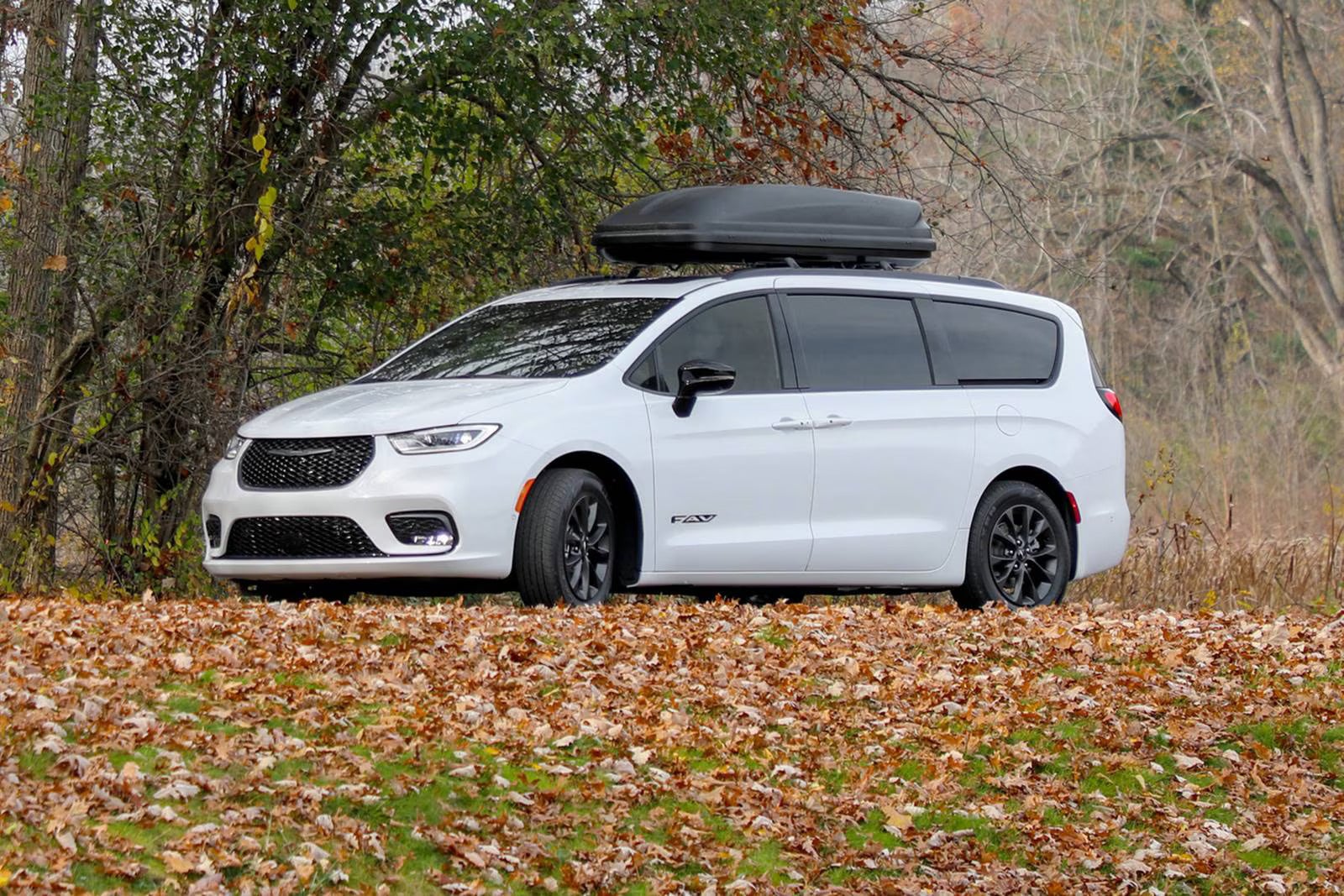 A white van sitting parked.