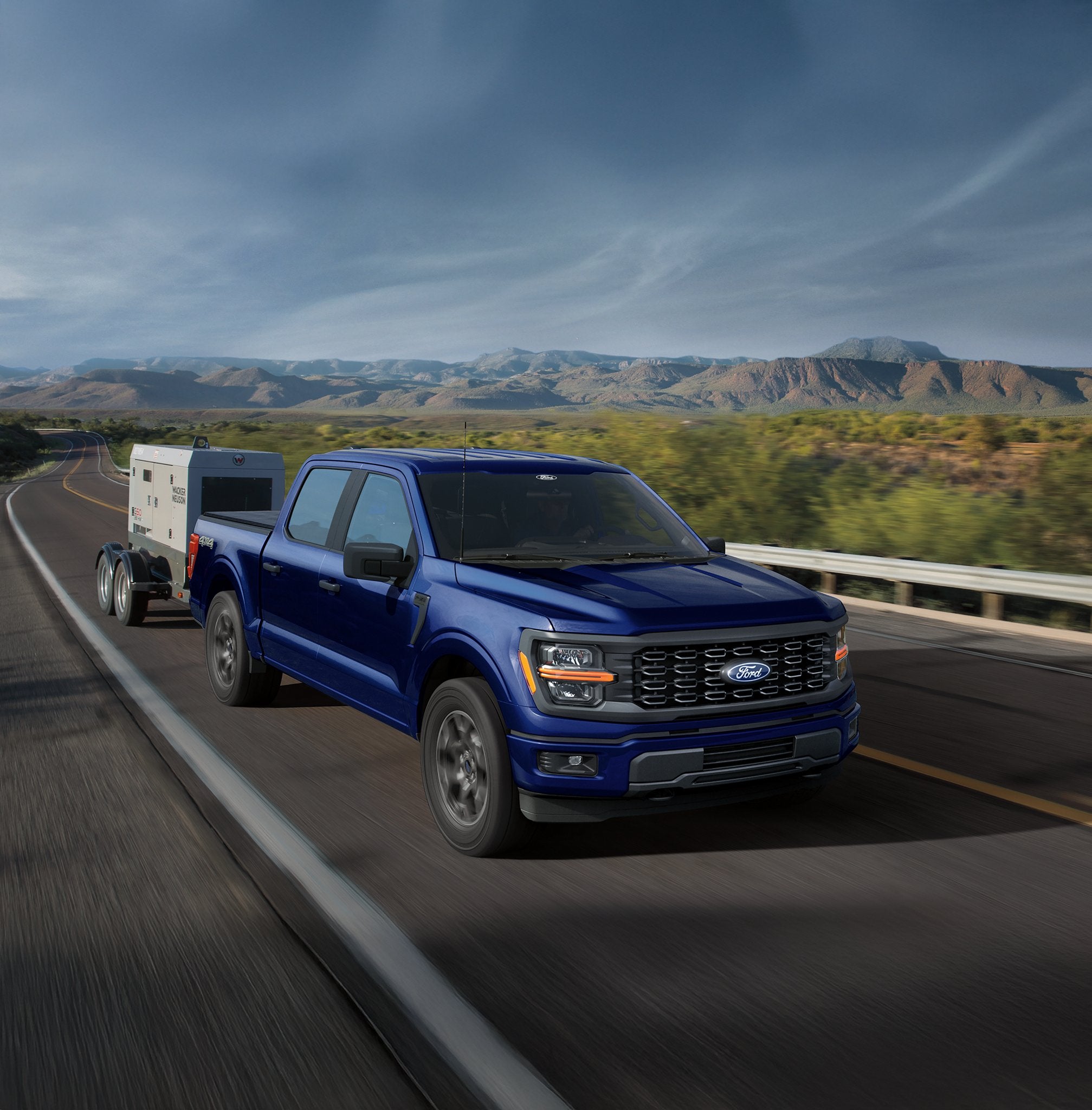 2026 Ford F-150 XL pulling a small trailer near Junction City, Kansas